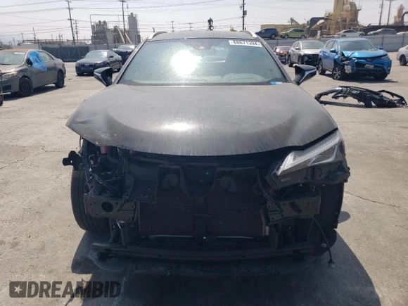 2022 Lexus UX 250h F Sport with VIN JTHE9JBH7N2059948, listed as a Copart auction lot 68671394 with 84,729 mi miles and Salvage Title. Bid and sale history available at DreamBid. Image 5.
