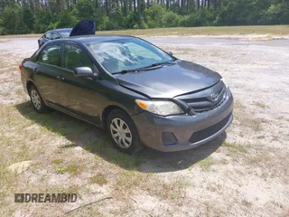 2011 Toyota Corolla L with VIN 2T1BU4EE0BC680158, listed as a IAAI auction lot 42060987 with 131,669 mi miles. Bid and sale history available at carsss.com. Image 1.