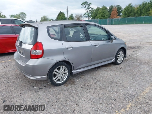 2007 Honda Fit Sport with VIN JHMGD37697S040265, listed as a IAAI auction lot 42130310 with 127,906 mi miles. Bid and sale history available at carsss.com. Image 4.