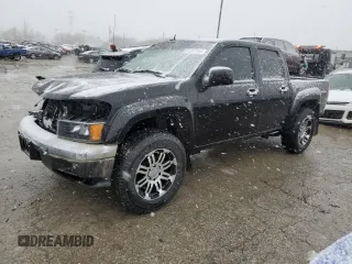 2011 GMC Canyon SLE1 with VIN 1GTH6MFE6B8141218, listed as a Copart auction lot 81897704 with 233,039 mi miles and Salvage Title. Bid and sale history available at carsss.com. Image 1.