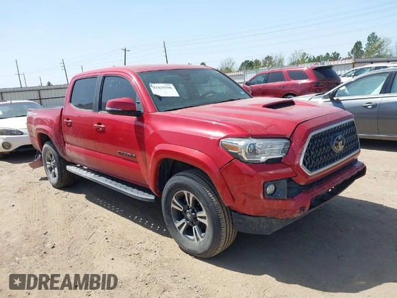 2018 Toyota Tacoma SR5 with VIN 5TFAZ5CN0JX063350, listed as a IAAI auction lot 41829396 with 61,155 mi miles and . Bid and sale history available at DreamBid. Image 1.