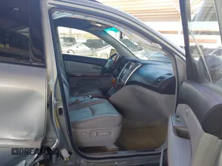 2008 Lexus RX 400h with VIN JTJGW31UX82006093, listed as a IAAI auction lot 41765158 with 191,977 mi miles and . Bid and sale history available at DreamBid. Image 5.