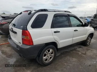 2005 Kia Sportage LX with VIN KNDJF723557078730, listed as a Copart auction lot 79823504 with 166,509 mi miles and Salvage Title. Bid and sale history available at carsss.com. Image 3.