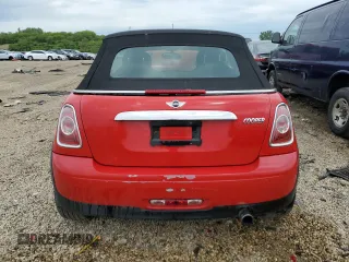 2012 MINI Convertible with VIN WMWZN3C58CT134224, listed as a Copart auction lot 57610015 with 141,394 mi miles and Salvage title. Bid and sale history available at DreamBid. Image 6.