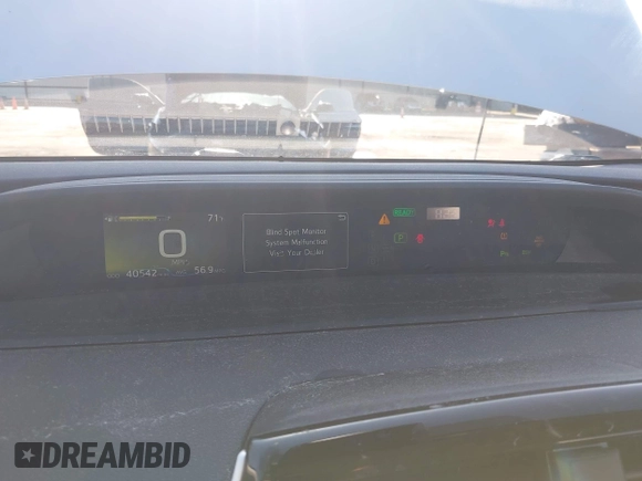 2021 Toyota Prius L Eco with VIN JTDKAMFU7M3142616, listed as a IAAI auction lot 42755833 with 40,542 mi miles and . Bid and sale history available at DreamBid. Image 7.
