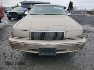 1992 Chrysler New Yorker z VIN 1C3XV66R9ND794543, wystawiony jako Copart lot #45347925 z przebiegiem 46 550 mil mil oraz Tytuł czysty. Historia ofert i sprzedaży dostępna na DreamBid. Obrazek 5.