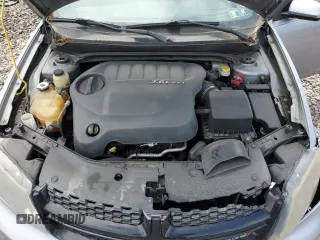 2014 Dodge Avenger SXT z VIN 1C3CDZCG6EN131544, wystawiony jako Copart lot #53955425 z przebiegiem 118 977 mil mil oraz Szkoda całkowita • Salvage title. Historia ofert i sprzedaży dostępna na DreamBid. Obrazek 11.