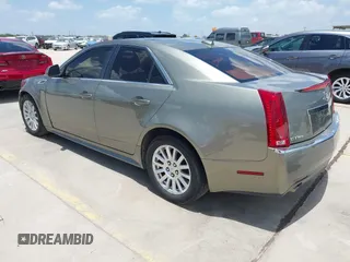 2010 Cadillac CTS Luxury with VIN 1G6DG5EG6A0148433, listed as a IAAI auction lot 42686517 with 106,701 mi miles and . Bid and sale history available at DreamBid. Image 3.