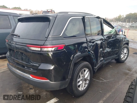 2023 Jeep Grand Cherokee Laredo with VIN 1C4RJHAG6PC671728, listed as a IAAI auction lot 40897386 with Not provided miles and . Bid and sale history available at DreamBid. Image 4.