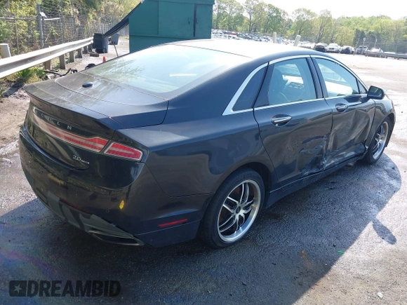 2015 Lincoln MKZ z VIN 3LN6L2G90FR602404, wystawiony jako IAAI lot #41946181 z przebiegiem 146 588 mil mil oraz . Historia ofert i sprzedaży dostępna na DreamBid. Obrazek 4.