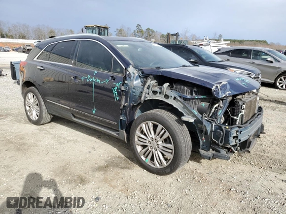 2017 Cadillac XT5 Premium Luxury FWD with VIN 1GYKNCRS5HZ198298, listed as a Copart auction lot 48212495 with 95,648 mi miles and Salvage Title. Bid and sale history available at DreamBid. Image 4.