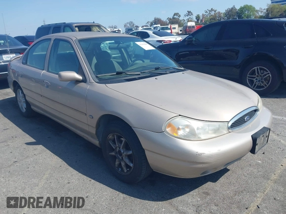 1999 Ford Contour z VIN 3FAFP66L6XM102099, wystawiony jako IAAI lot #42161889 z przebiegiem 100 340 mil mil oraz . Historia ofert i sprzedaży dostępna na DreamBid. Obrazek 1.