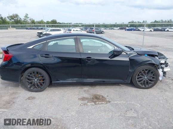 2020 Honda Civic Si with VIN 2HGFC1E50LH702493, listed as a IAAI auction lot 40609245 with 62,660 mi miles and . Bid and sale history available at DreamBid. Image 13.