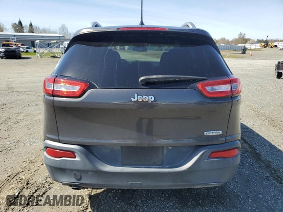2014 Jeep Cherokee Latitude with VIN 1C4PJLCB2EW245753, listed as a Copart auction lot 49452985 with 106,240 mi miles and Salvage Title. Bid and sale history available at carsss.com. Image 6.