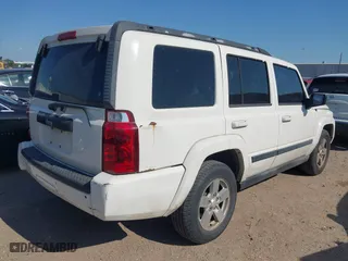 2007 Jeep Commander Sport with VIN 1J8HH48K07C587312, listed as a IAAI auction lot 42004278 with 208,390 mi miles. Bid and sale history available at carsss.com. Image 4.