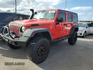 2013 Jeep Wrangler Unlimited Rubicon 10th Anniversary with VIN 1C4HJWFG9DL603931, listed as a Copart auction lot 73400214 with 133,272 mi miles and Salvage title. Bid and sale history available at DreamBid. Image 1.