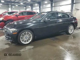2015 BMW 3 Series 328i xDrive with VIN WBA3B3C50FJ984086, listed as a Copart auction lot 52006475 with 147,065 mi miles and Salvage Title. Bid and sale history available at carsss.com. Image 1.
