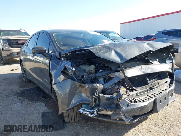 2018 Ford Fusion SE z VIN 3FA6P0LU8JR116073, wystawiony jako IAAI lot #41773037 z przebiegiem 100 864 mil mil oraz . Historia ofert i sprzedaży dostępna na DreamBid. Obrazek 1.