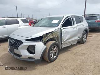 2019 Hyundai Santa Fe SE z VIN 5NMS23AD4KH046066, wystawiony jako IAAI lot #41880900 z przebiegiem 45 220 mil mil oraz . Historia ofert i sprzedaży dostępna na DreamBid. Obrazek 18.