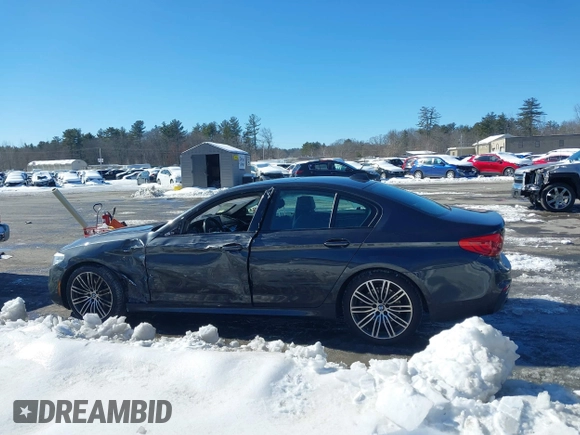 2019 BMW 5 Series 530i xDrive with VIN WBAJA7C50KWW05263, listed as a IAAI auction lot 41571583 with 71,185 mi miles and . Bid and sale history available at DreamBid. Image 14.