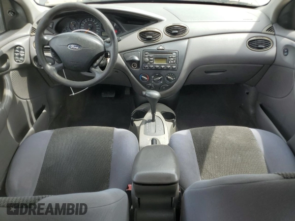 2004 Ford Focus SE z VIN 1FAFP34384W130421, wystawiony jako Copart lot #54045255 z przebiegiem 172 319 mil mil oraz Szkoda całkowita • Salvage title. Historia ofert i sprzedaży dostępna na DreamBid. Obrazek 8.