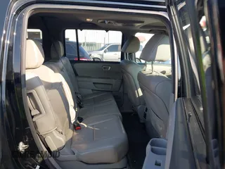 2013 Honda Pilot Touring z VIN 5FNYF4H96DB084148, wystawiony jako IAAI lot #42465066 z przebiegiem 220 339 mil mil oraz . Historia ofert i sprzedaży dostępna na DreamBid. Obrazek 8.
