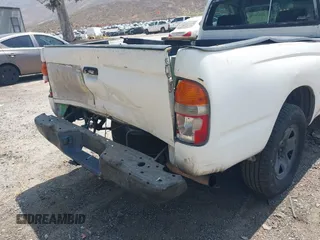 2001 Toyota Tacoma z VIN 5TENL42N11Z770366, wystawiony jako IAAI lot #42339570 z przebiegiem 427 064 mil mil oraz . Historia ofert i sprzedaży dostępna na DreamBid. Obrazek 6.