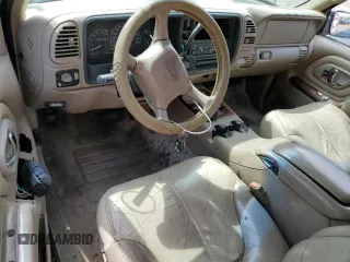 1999 GMC Denali z VIN 1GKEK13R1XR917376, wystawiony jako Copart lot #64991924 z przebiegiem 247 231 mil mil oraz Tytuł czysty. Historia ofert i sprzedaży dostępna na DreamBid. Obrazek 8.