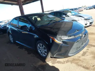 2023 Toyota Corolla LE z VIN JTDB4MEE2PJ000577, wystawiony jako IAAI lot #41871348 z przebiegiem 61 331 mil mil oraz . Historia ofert i sprzedaży dostępna na DreamBid. Obrazek 1.