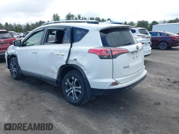 2018 Toyota RAV4 LE with VIN JTMBFREV5JJ738405, listed as a IAAI auction lot 41956145 with 100,593 mi miles and . Bid and sale history available at DreamBid. Image 3.