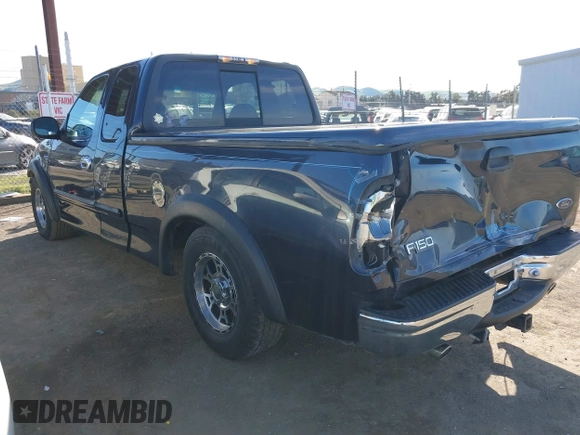 1999 Ford F-150 XL with VIN 1FTRX17L4XKA58054, listed as a IAAI auction lot 41647530 with 225,632 mi miles. Bid and sale history available at carsss.com. Image 3.