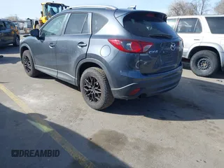 2013 Mazda CX-5 Touring with VIN JM3KE2CE6D0122405, listed as a IAAI auction lot 41743037 with 154,647 mi miles and . Bid and sale history available at carsss.com. Image 3.