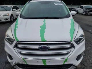 2017 Ford Escape SE z VIN 1FMCU0GD7HUC33240, wystawiony jako Copart lot #59627995 z przebiegiem 105 670 mil mil oraz Czysty tytuł • Clean title. Historia ofert i sprzedaży dostępna na DreamBid. Obrazek 5.