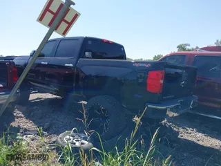 2016 Chevrolet Silverado 1500 LT with VIN 3GCUKREC3GG231290, listed as a IAAI auction lot 40113464 with 160,109 mi miles. Bid and sale history available at carsss.com. Image 3.