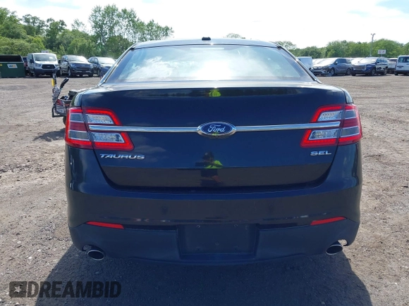 2015 Ford Taurus SEL with VIN 1FAHP2E88FG181055, listed as a IAAI auction lot 42307640 with 104,702 mi miles and . Bid and sale history available at DreamBid. Image 15.