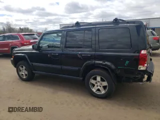 2009 Jeep Commander Sport z VIN 1J8HG48K39C554570, wystawiony jako Copart lot #52667825 z przebiegiem 194 886 mil mil oraz Szkoda całkowita • Salvage title. Historia ofert i sprzedaży dostępna na DreamBid. Obrazek 2.
