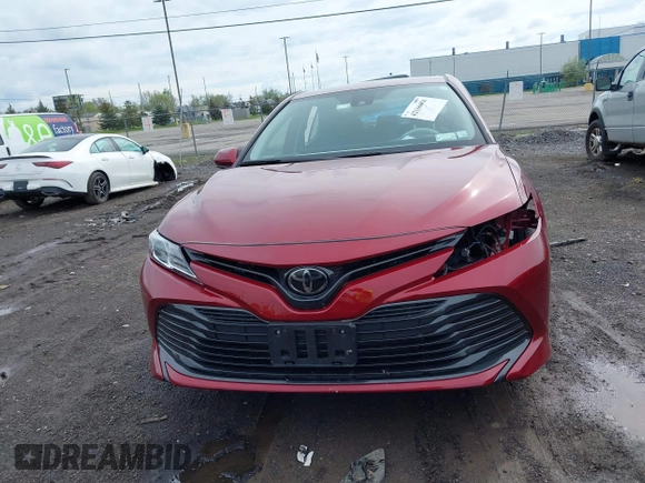 2019 Toyota Camry LE with VIN 4T1B11HK8KU823736, listed as a IAAI auction lot 42166696 with 21,732 mi miles and . Bid and sale history available at DreamBid. Image 12.