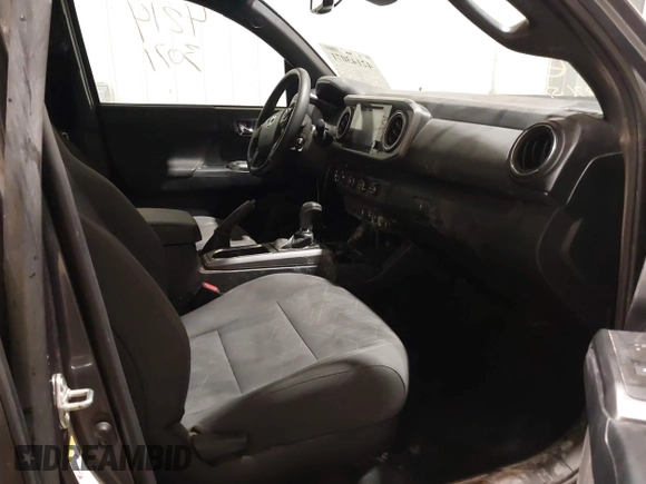 2019 Toyota Tacoma SR with VIN 5TFCZ5AN7KX208672, listed as a IAAI auction lot 42143071 with 83,584 mi miles and . Bid and sale history available at DreamBid. Image 5.