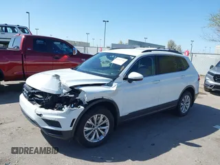 2019 Volkswagen Tiguan SE with VIN 3VV2B7AX8KM193166, listed as a IAAI auction lot 41957720 with 61,981 mi miles and . Bid and sale history available at DreamBid. Image 17.