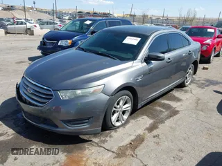 2013 Ford Taurus SEL with VIN 1FAHP2E81DG113242, listed as a IAAI auction lot 41952486 with 169,369 mi miles. Bid and sale history available at carsss.com. Image 2.
