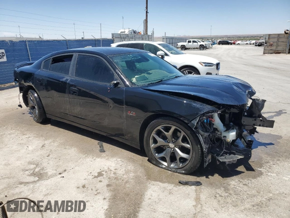 2015 Dodge Charger RT with VIN 2C3CDXCT9FH918273, listed as a Copart auction lot 55605814 with 101,521 mi miles and Clean Title. Bid and sale history available at DreamBid. Image 4.