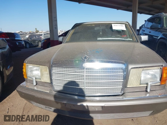 1990 Mercedes-Benz 560 with VIN WDBCA39E7LA505668, listed as a IAAI auction lot 41473380 with 159,716 mi miles and . Bid and sale history available at DreamBid. Image 6.