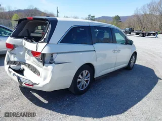 2016 Honda Odyssey EX-L with VIN 5FNRL5H68GB137297, listed as a IAAI auction lot 41925641 with 113,665 mi miles. Bid and sale history available at carsss.com. Image 4.
