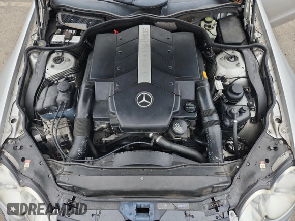 2005 Mercedes-Benz SL 500 with VIN WDBSK75F65F093215, listed as a Copart auction lot 63744135 with 94,645 mi miles and Salvage title. Bid and sale history available at DreamBid. Image 11.