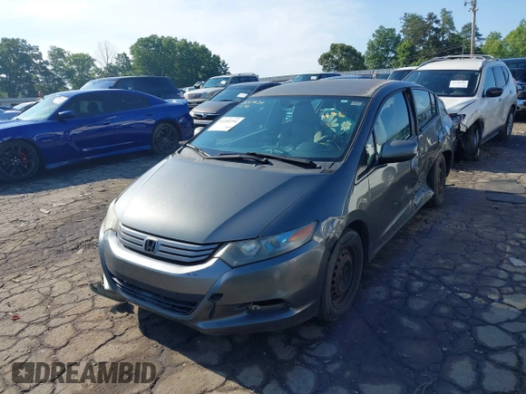 2010 Honda Insight LX with VIN JHMZE2H52AS032697, listed as a IAAI auction lot 42255794 with 262,251 mi miles and . Bid and sale history available at DreamBid. Image 17.