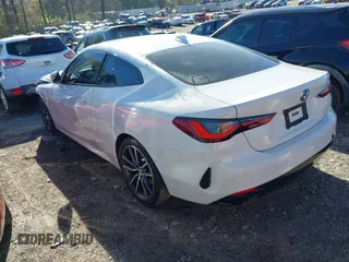 2021 BMW 4 Series 430i with VIN WBA53AP06MCG36919, listed as a IAAI auction lot 41863554 with 33,556 mi miles and . Bid and sale history available at DreamBid. Image 3.