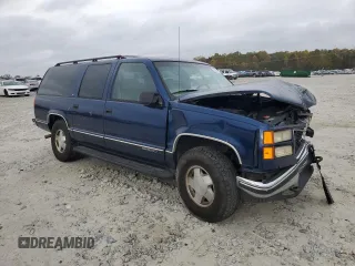 1997 GMC Suburban with VIN 3GKFK16R4VG519902, listed as a Copart auction lot 79031204 with 195,624 mi miles and Salvage Title. Bid and sale history available at DreamBid. Image 4.