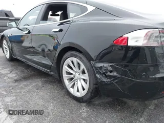 2016 Tesla Model S 70 with VIN 5YJSA1E1XGF154577, listed as a IAAI auction lot 41778697 with 62,630 mi miles and . Bid and sale history available at DreamBid. Image 11.