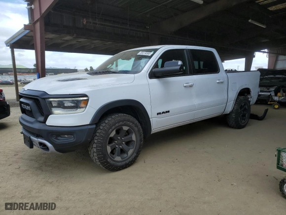 2019 Ram 1500 Rebel with VIN 1C6SRFLTXKN618849, listed as a Copart auction lot 50419595 with 98,219 mi miles and Salvage Title. Bid and sale history available at carsss.com. Image 1.