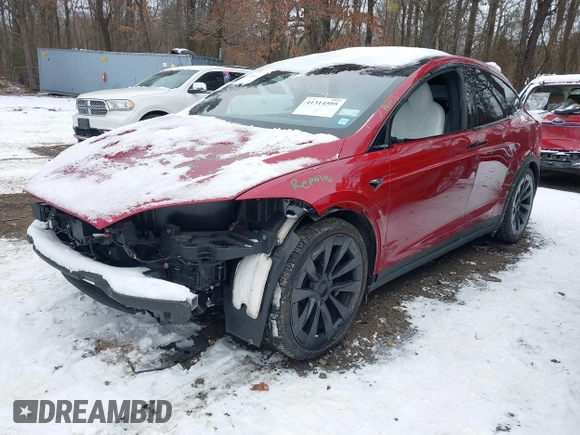 2023 Tesla Model X with VIN 7SAXCBE51PF404297, listed as a IAAI auction lot 41314595 with 25,020 mi miles and . Bid and sale history available at DreamBid. Image 6.